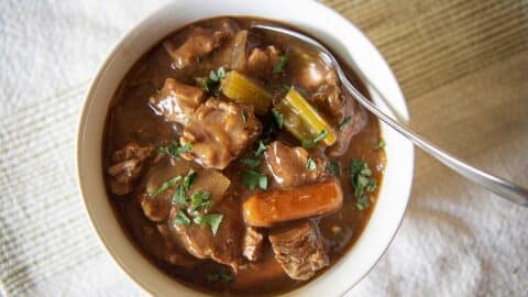 Crockpot beef stew in a white bowl