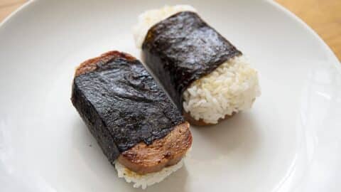Two Spam musubis on a white plate