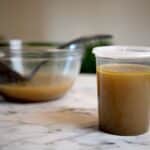 Chicken stock in a storage container