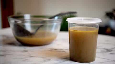Chicken stock in a storage container