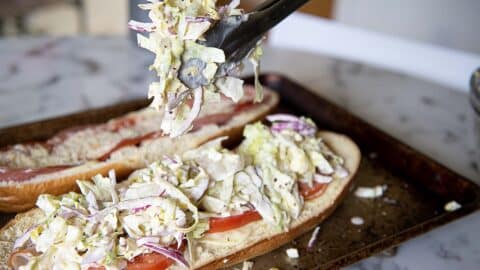 Grinder salad scooped onto a sub.