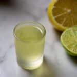 White Tea Shot Sitting on a Marble Table