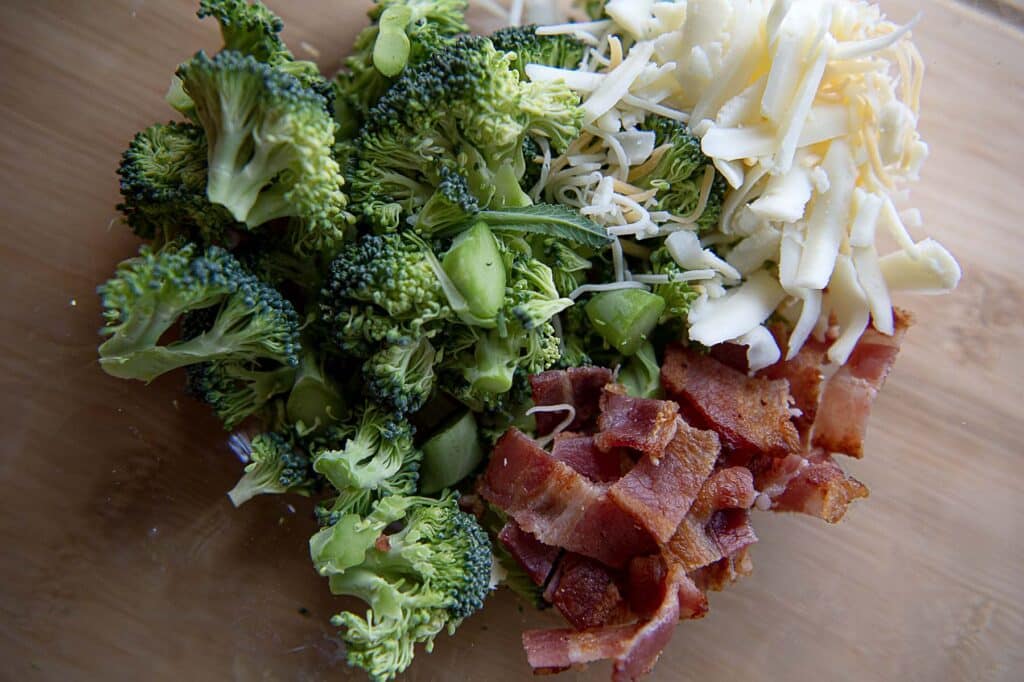 Broccoli with bacon, and shredded cheese