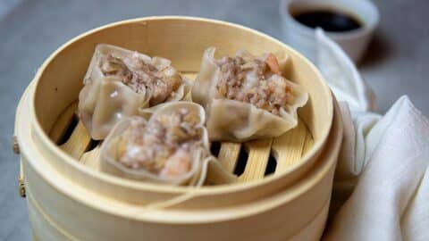 Shrimp shumai in a bamboo steamer