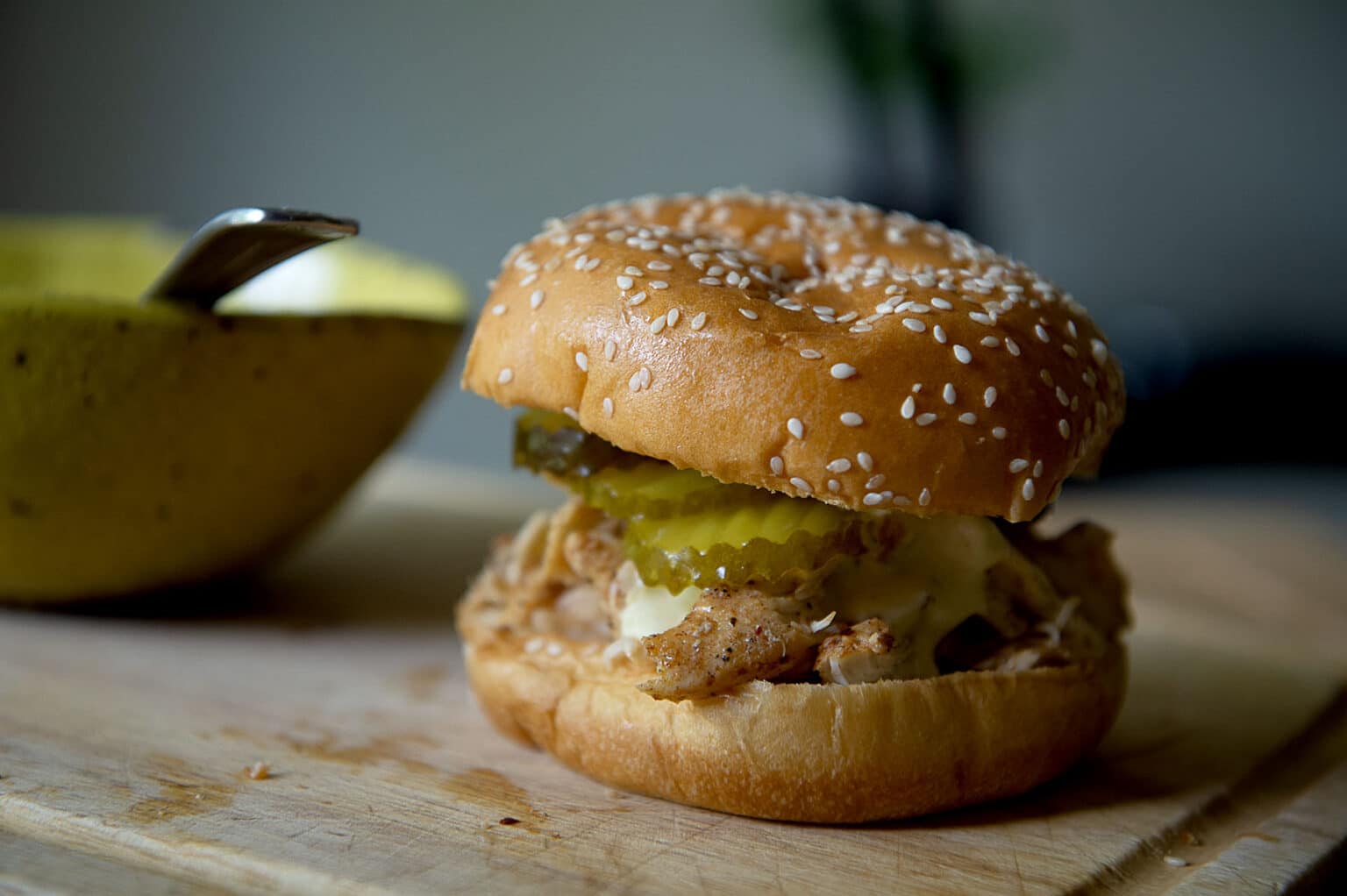 Alabama Chicken Sandwich on a wooden board.