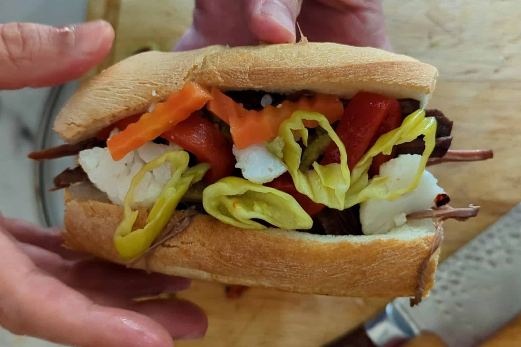 https://thembites.com/wp-content/uploads/2023/10/italian-beef.jpg