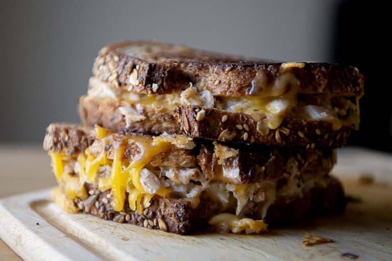 An up close shot of a crab melt from the side.