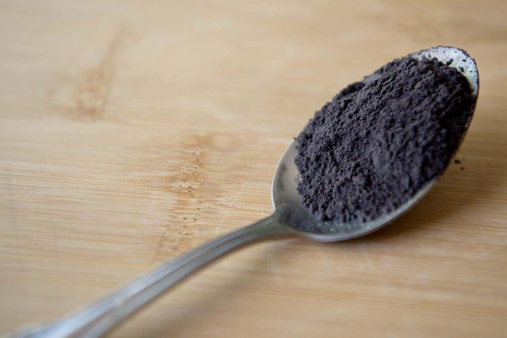 Alkanet resting in a spoon.