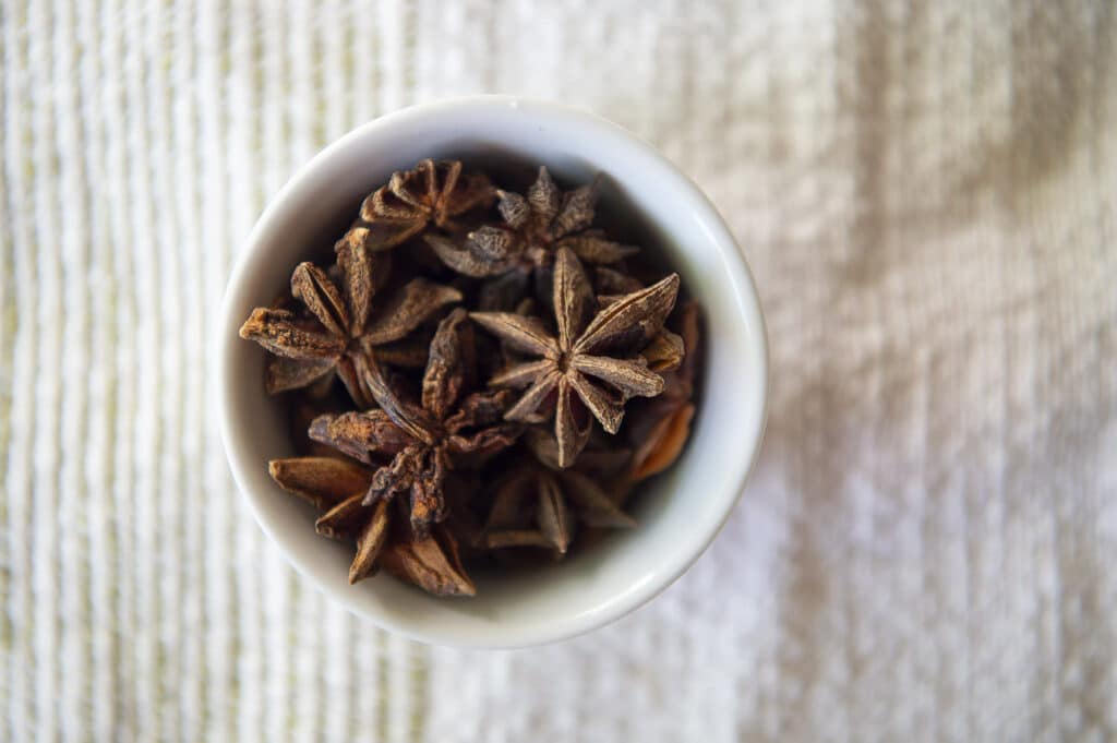 Top down shot of anise in a ramakin.