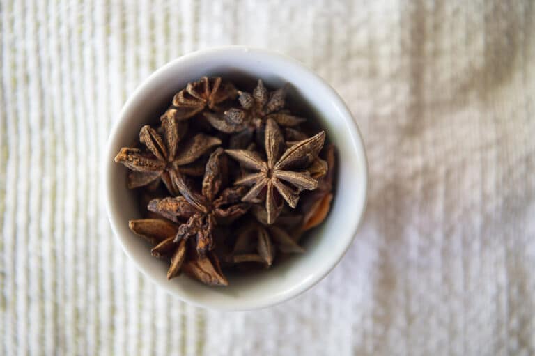 Top down shot of anise in a ramakin.