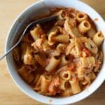 chicken riggies sitting in a bowl with a fork.