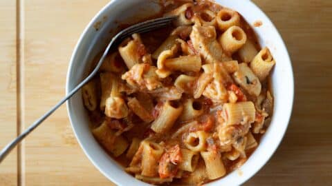 chicken riggies sitting in a bowl with a fork.
