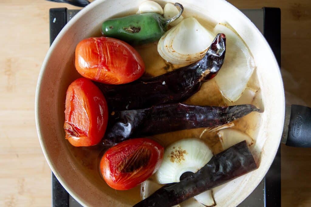 In this picture you can see the charred vegetables for Migas.